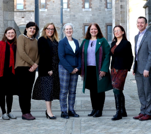 panelists of the AIB-RINCE Event-The future of work and hybrid workplaces  in the post pandemic world standing outside St laurences church