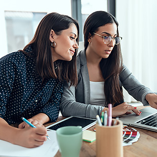 Two female students studying