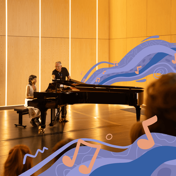 student and teacher playing piano