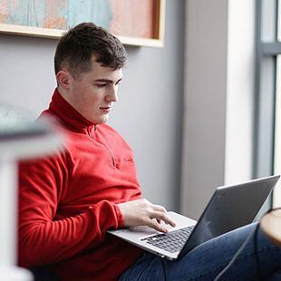 student working on laptop at TUDublin