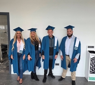 Certificate in Arts in Intercultural Community Development graduates celebrate receiving their certs