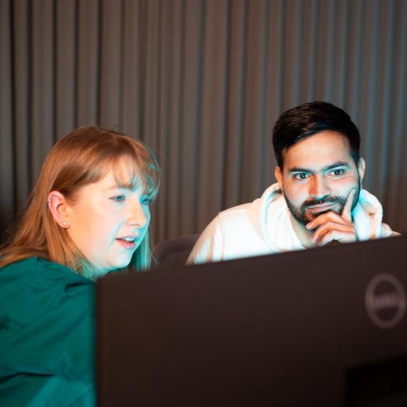Two student looking at Computer Screen